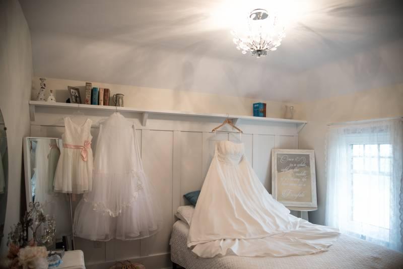 Bridal Gown beautifully displayed in the Heritage Home Bridal Suite