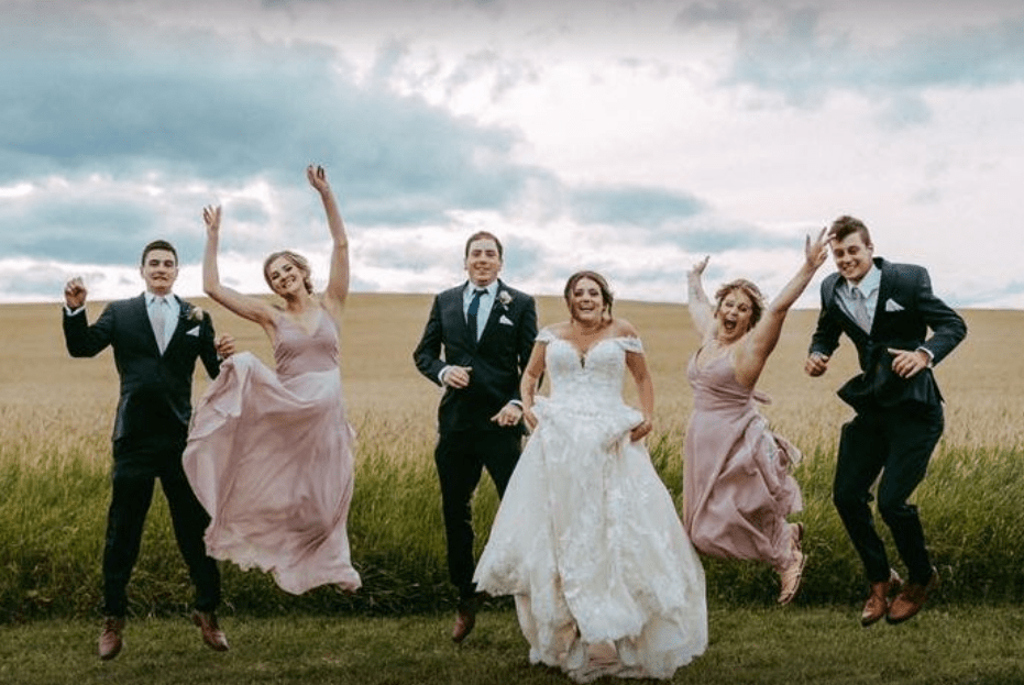 Wedding Party jump for joy