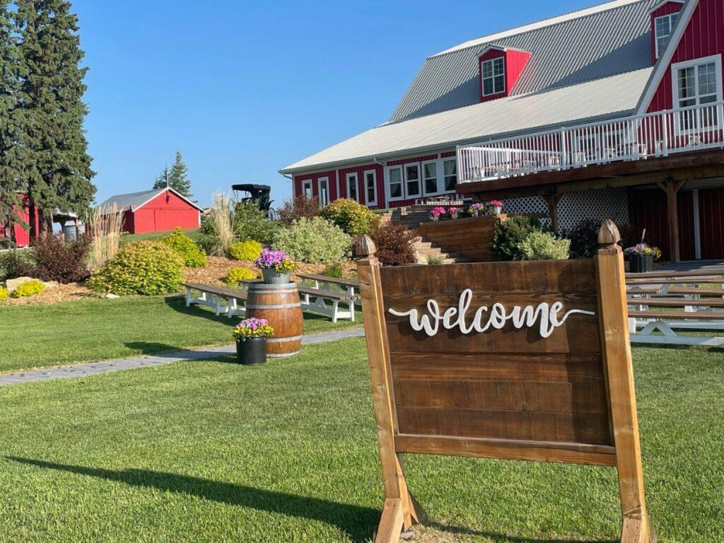 Calgary Wedding Venue Packages include the opportunity to host an outdoor wedding in front of our beautiful barn wedding venue.   This picture shows the set up for the outdoor ceremony. 