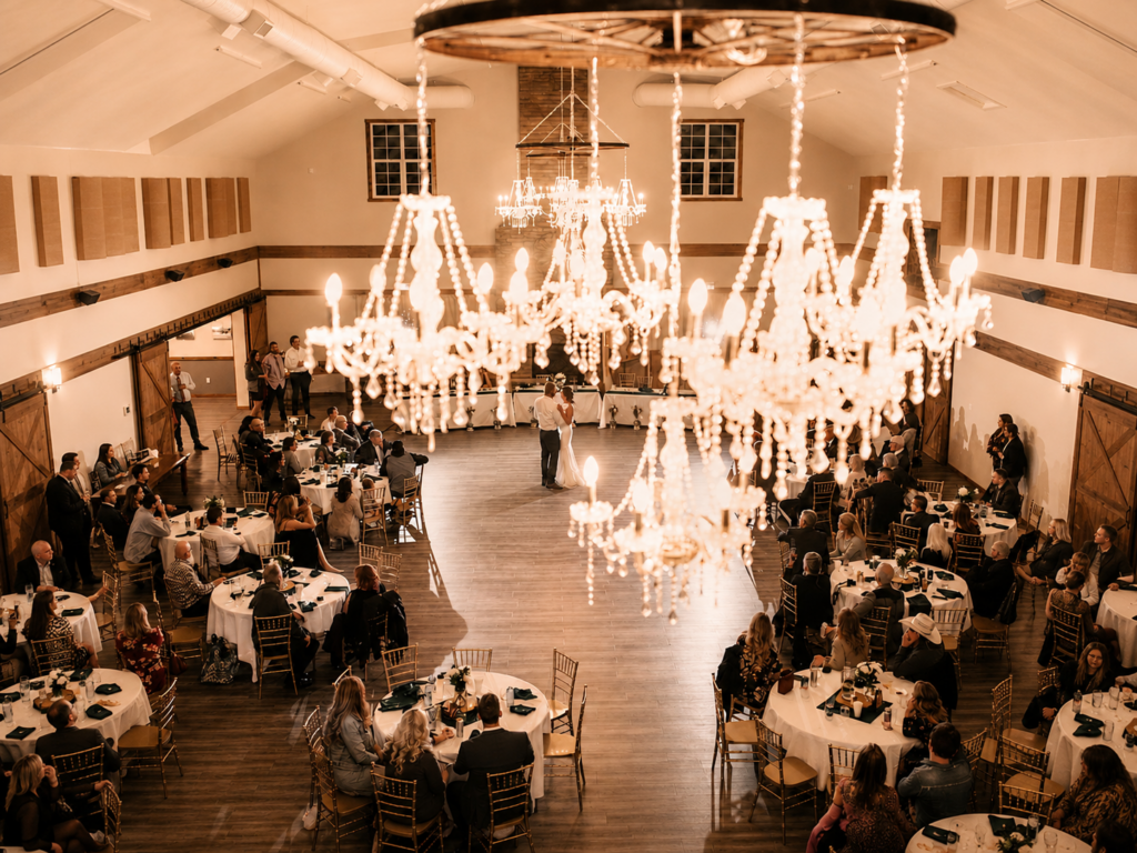 First Dance in The Heritage Centre Ballroom | The Heritage Centre by Mountain View Events Ltd. | The Heritage Centre by Mountain View Events Ltd. Newlyweds share their first dance beneath glowing crystal chandeliers in The Heritage Centre ballroom near Calgary.