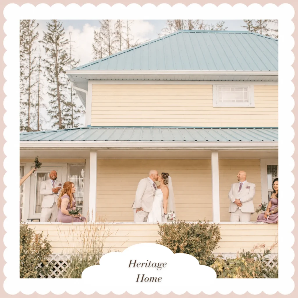 Heritage Home Bridal Suite | The Heritage Centre by Mountain View Events Ltd. | The Heritage Centre by Mountain View Events Ltd. Newlywed couple kissing on the veranda of the 1915 Heritage Home with their wedding party nearby