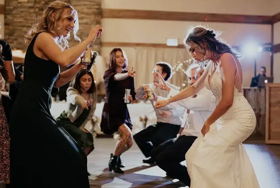 Bride dancing with wedding guests in the Grand Ballroom at The Heritage Centre.
