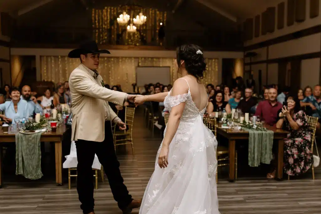 Newlywed couple sharing their first dance in the Grand Ballroom at The Heritage Centre.