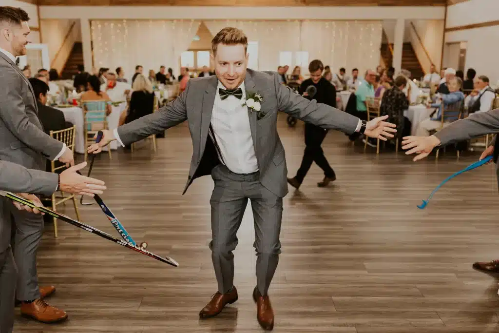 Groom dancing with his wedding party in the Grand Ballroom at The Heritage Centre.