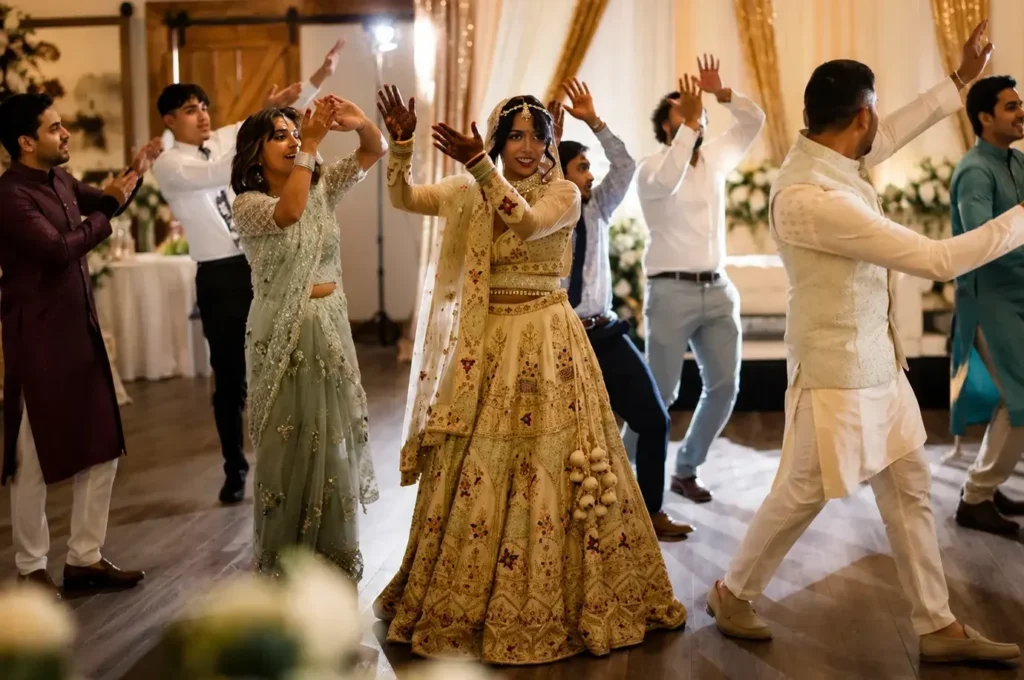 Bride and guests performing a South Asian wedding dance in the Grand Ballroom.